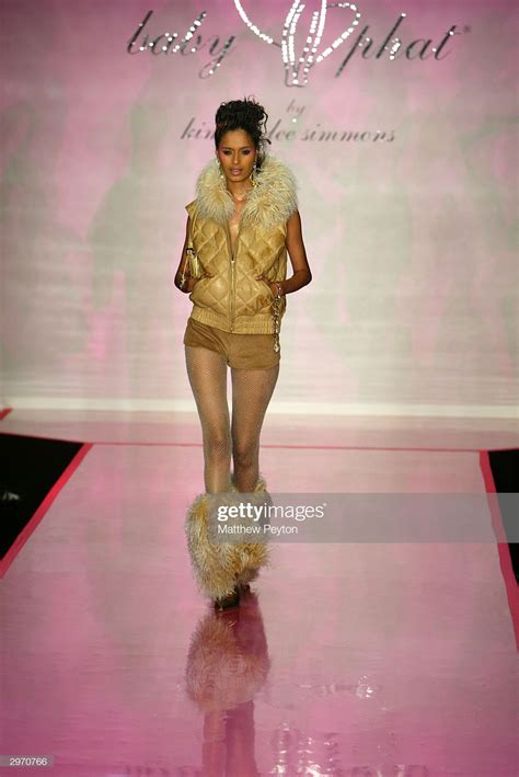 News Photo A Model Walks The Runway At The Baby Phat Fashion