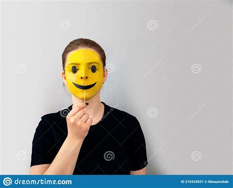 Young Womanteenage Girl Portraitface Painted Yellowfake Smilefalse