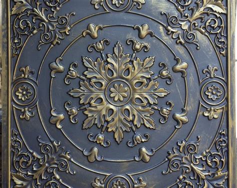 An Intricately Designed Metal Plate On The Side Of A Building