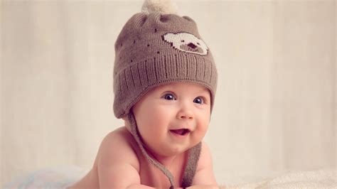 Download Smiling Adorable Baby Love Wallpaper