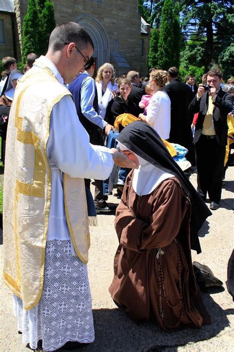 Check Out This Picture Of A Newly Ordained Priest Blessing His Sister