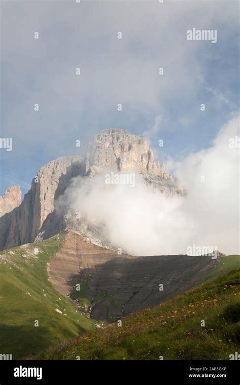 Cloud And Mist Swirling Around The Cliffs Of The Langkofel Cinque Dita