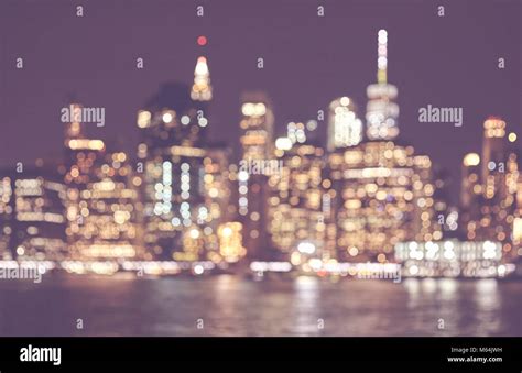 Blurred Retro Toned Picture Of Manhattan Skyline At Night Abstract