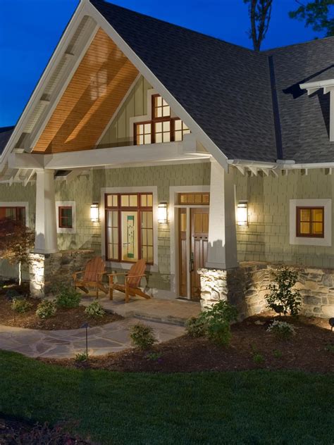 This Craftsman-style home has a large, inviting front porch accentuated ...