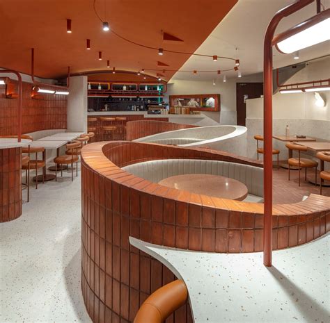 This New Delhi Restaurant Is A Warm Play Of Terracotta Terrazzo And