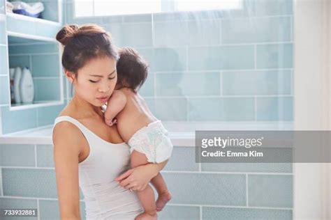 Asian Mom Bath Photos And Premium High Res Pictures Getty Images