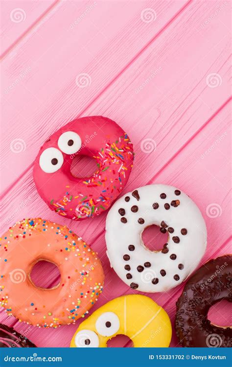 Assortment Of Donuts On Wooden Background Stock Photo Image Of