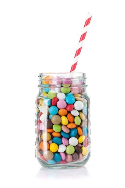 Premium Photo Colorful Sweets Lollipops And Candies Isolated On White