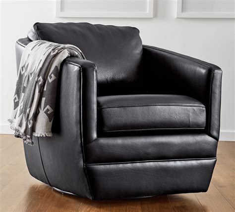 A Modern Leather Swivel Chair That Looks Right At Home In Any Space
