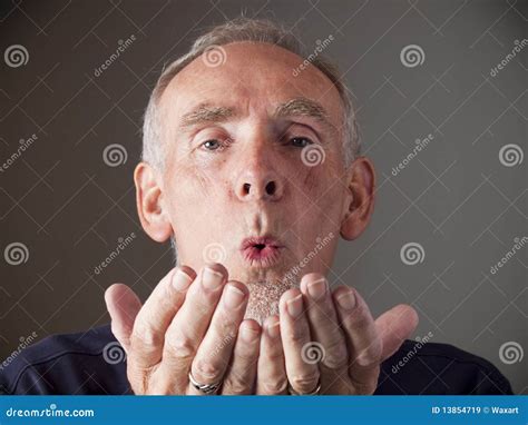Old Man Blowing A Kiss Stock Image Image Of Senior Hands 13854719