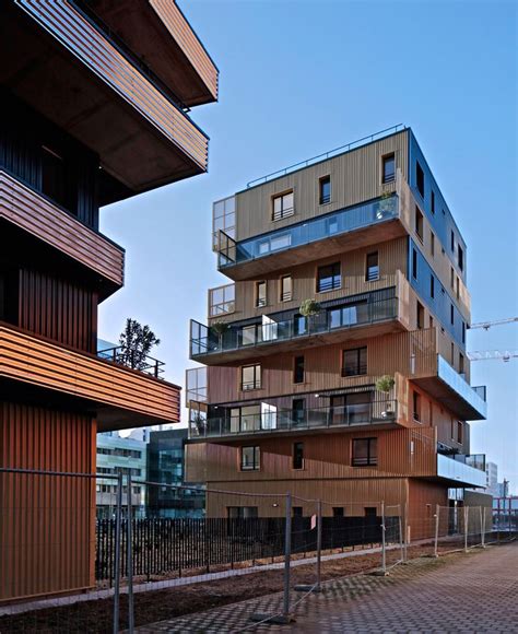 Inoxia Apartments Feature Jagged Wraparound Balconies Facade