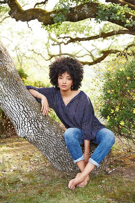 Portrait Of African American Woman Relaxing In Nature By Trinette Reed