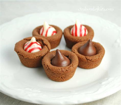 The best recipe for soft thumbprint hershey kiss cookies (a.k.a peanut butter blossoms). Hershey Mint Kiss Cookie Cups