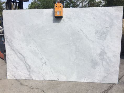Super White Granite Features Smooth Patterns Of Gray Across A White
