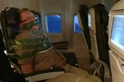 Airline Passenger Duct Taped To Seat For Safety Video