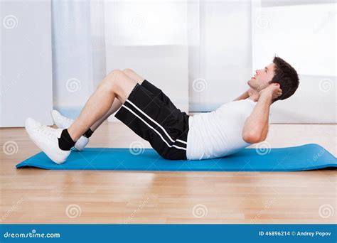 Young Man Doing Sit Ups Stock Photo Image Of Caucasian 46896214