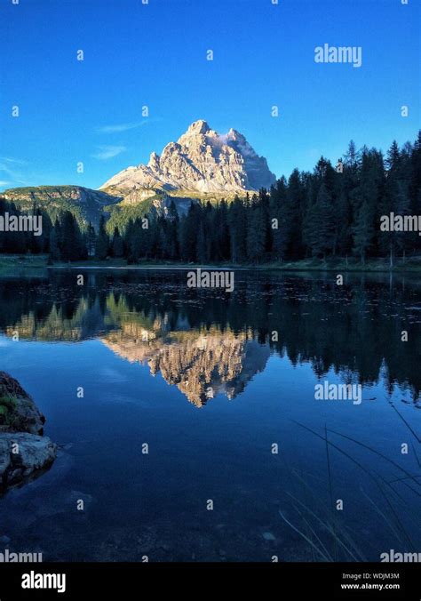 Scenic View Of Mountain Reflection In Lago D Antorno Stock Photo Alamy