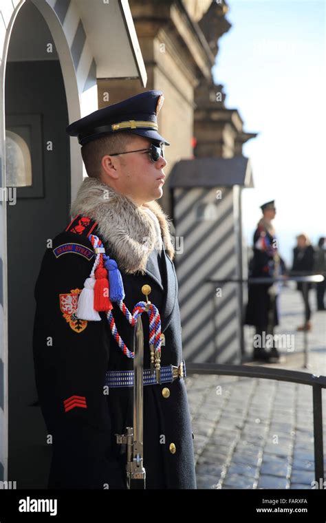 A Castle Guard Stands In His Sentry Box Outside The Castle In Prague