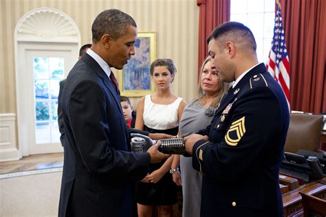 Sergeant First Class Leroy Arthur Petry Shows President Barack Obama A