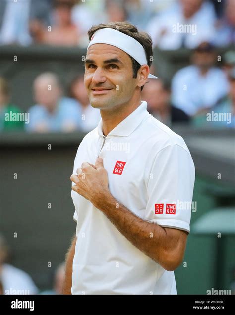 Side View Of Swiss Tennis Player Roger Federer Smiling After His Match