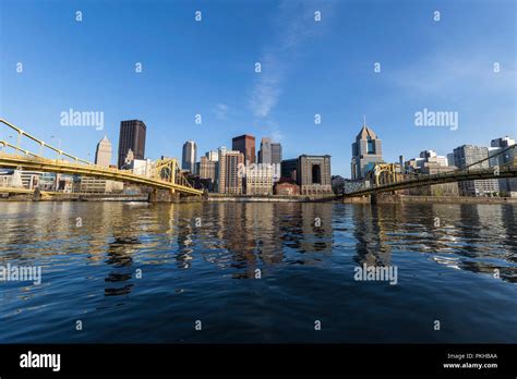 Downtown Urban Waterfront And Bridges Crossing The Allegheny River In
