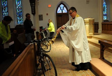 St Andrews Priest Provides Blessing Of Bicycles For Cycling Enthusiasts
