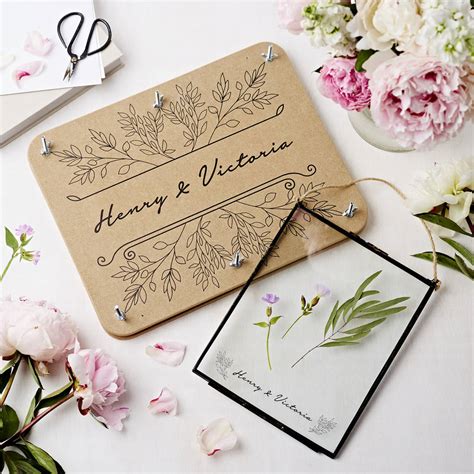 Maybe you would like to learn more about one of these? flower press and glass frame wedding flowers set by ...