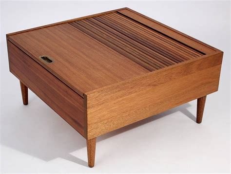 Aside from the sneaky bits, keal's furniture just happens to be sleek, well made. Brown Saltman Coffee Table by John Keal For Sale at 1stdibs