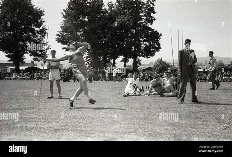 1950s Historical Summertime And Outside In A Sports Field At A School