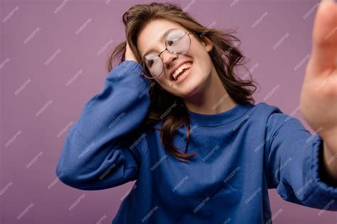 Free Photo Cute Young European Brunette Girl In Glasses And Hoodie