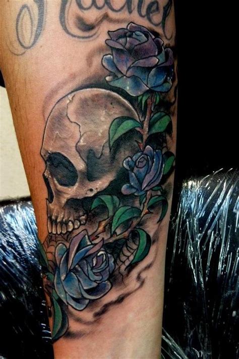 The most effective cover up tattoo ideas are the ones that leave no trace of the previous work, instead leaving behind a beautiful new image. Skull & roses coverup by Mully : Tattoos