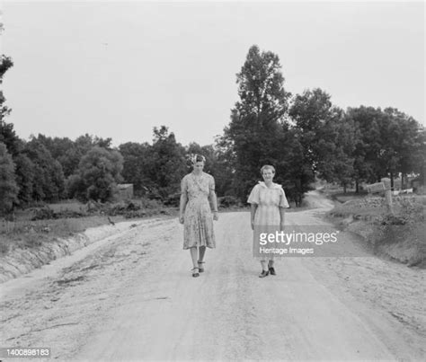walking down the road photos and premium high res pictures getty images