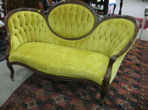 Classic Victorian Love Seat With Upholstered Velvet Carved Arms And Oval Back Button Tufted
