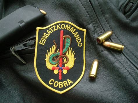 You can download in.ai,.eps,.cdr,.svg,.png formats. Sleeve badge "EKO COBRA" (Austria´s "SWAT-Team")