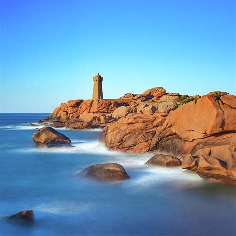 Ploumanach Lighthouse Sunset In Pink Granite Coast Brittany France