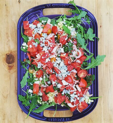 Heirloom Tomato Salad With Charred Corn Arugula And Bleu Cheese — The