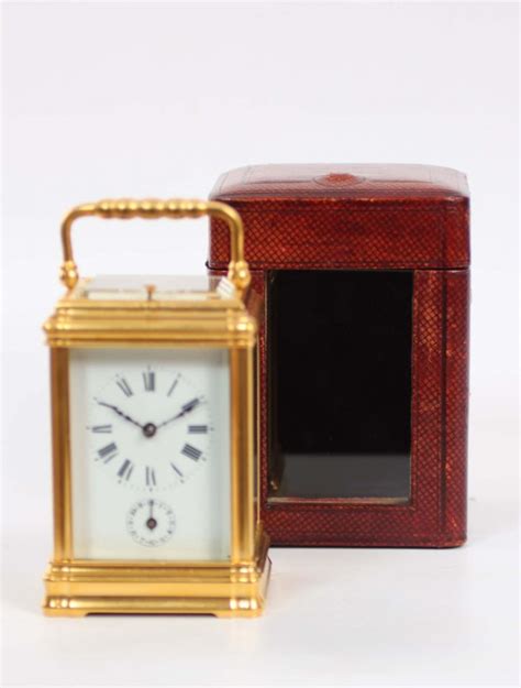 A Fine French Gilt Brass Gorge Case Repeating Alarm Carriage Clock