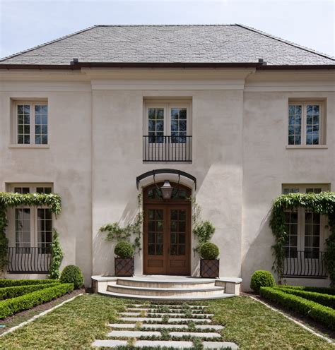 Make sure your modern driveway sends the message of being a part of the house , of modern homes are often decorated with simplicity in mind. Stucco Manor - William T. Baker | Award-Winning Classical ...