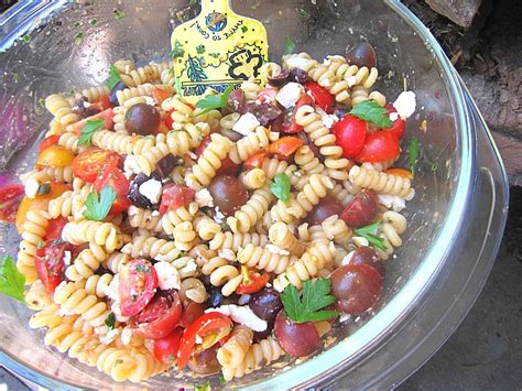 The dressing is to die for! Ina's Tomato Pasta Salad w/ Sundried Tomato Vinaigrette & Feta