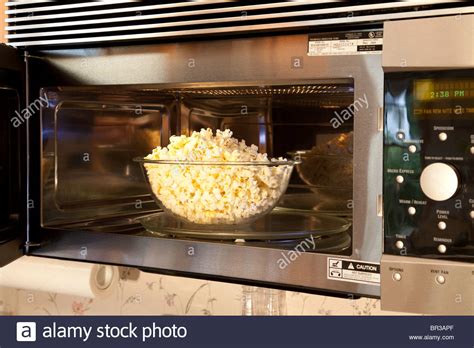 Microwave Oven And Popcorn Stock Photo Royalty Free Image