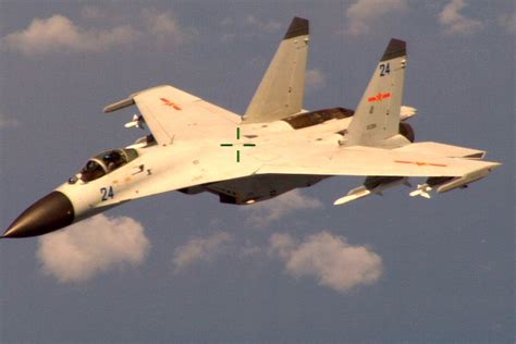 Chinese fighter jet made 'dangerous intercept': US