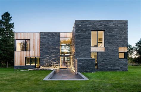 Contemporary Farmhouse Design Mixes Wood Stone And Glass