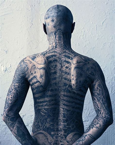 Whether it's traditional skull tattoos or modern ones, skulls have always been a prominent theme for tattoos. RICK GENEST (ZOMBIE BOY) TATTOO PICTURES IMAGES PICS PHOTOS OF HIS TATTOOS
