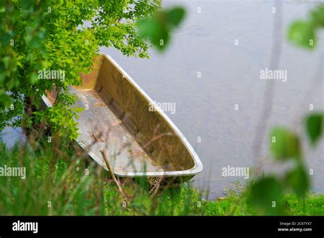 Abandoned Boat On Lake Between Trees Stock Photo Alamy