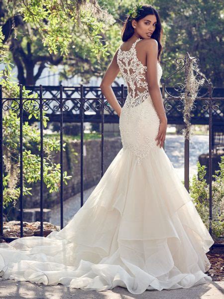 Fit and flare wedding dresses are endlessly beautiful. Deep V-neck Halter Lace Applique Fit And Flare Wedding ...