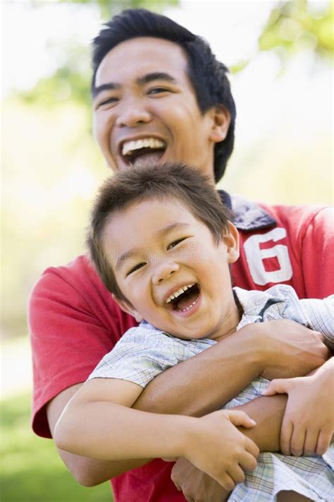 Asian Father And Son Having Fun In Park Royalty Free Stock Images My Xxx Hot Girl