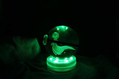 Aesthetic glow-in-the-dark crystal Pokeballs selling on Etsy for S$68. ...