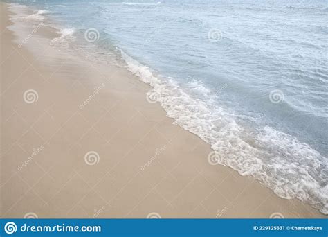 Sea Waves Rolling Onto Sandy Tropical Beach Stock Image Image Of