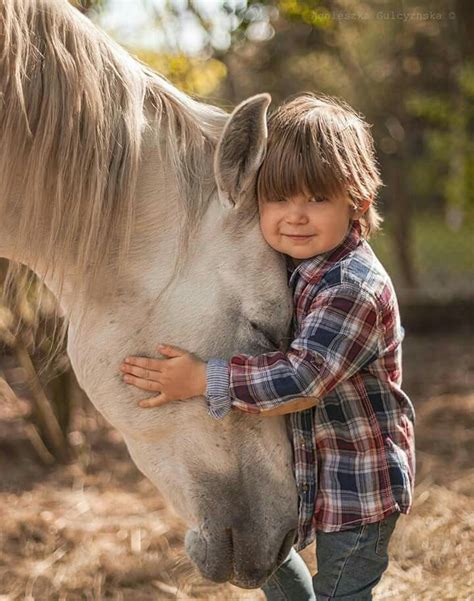 Tiny Boy Hugging A Horse Awe Look At The Sweet Eyes On