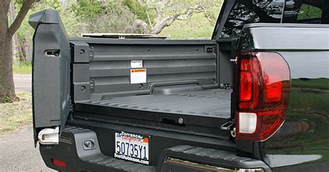 How much weight can a Ridgeline tailgate hold?